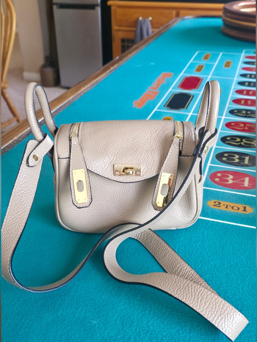 Vera Pelle Pebbled Taupe Crossbody with Gold-Tone Locks